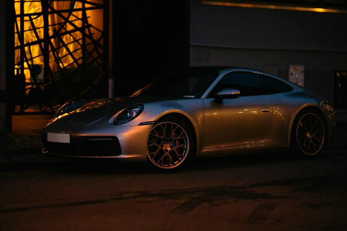 A sports car in a dark garage