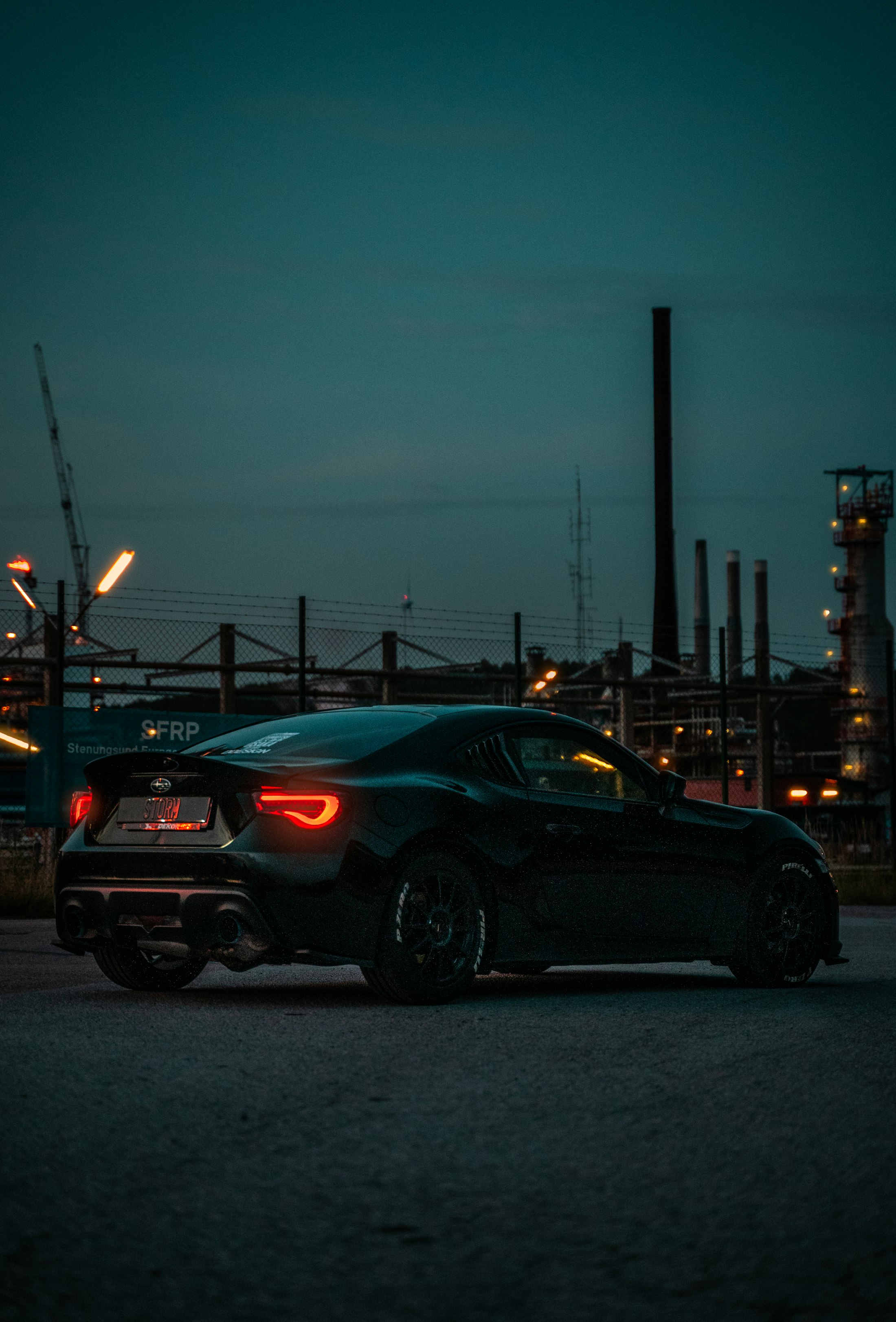 A car driving on the road at night