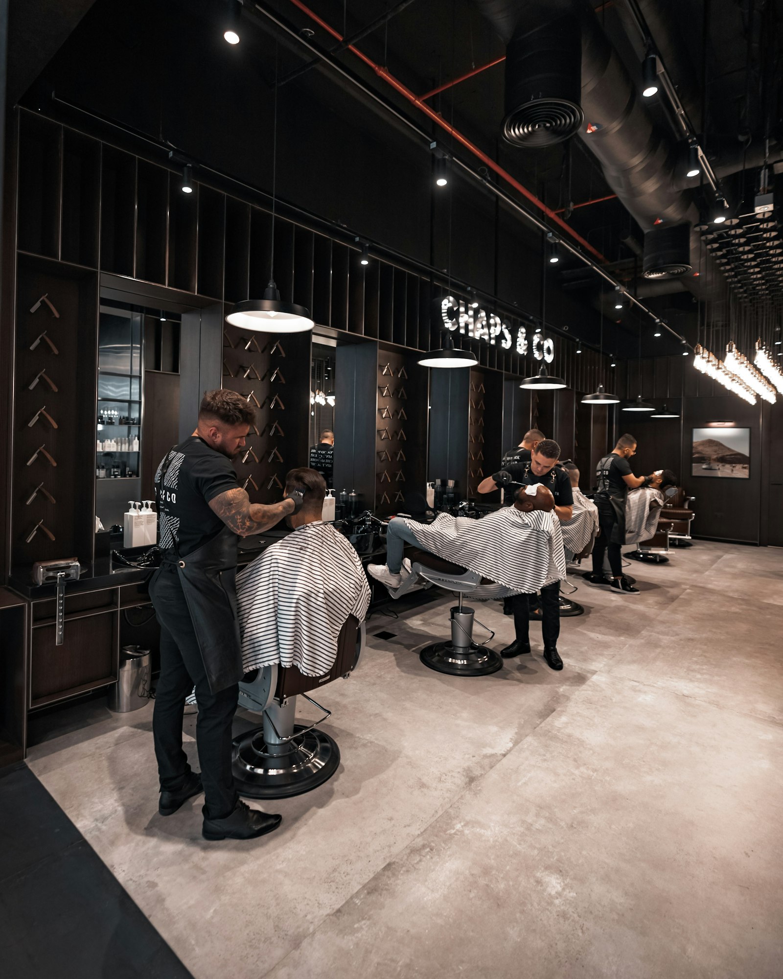 Barbers at work in the Zuid shop